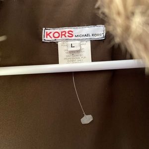 Michael Kors fur vest, tag states Large but FIT is small no tags